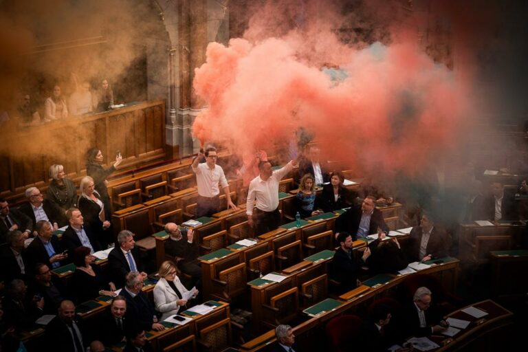 Smoke bombs in the Hungarian Parliament 6 lawmakers fined, banned